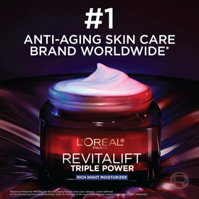L'Oreal Paris jar on nightstand suggesting evening skincare routine benefit