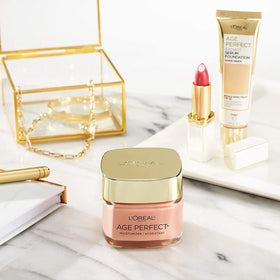 L'Oreal Paris 1.7 oz jar next to coin for size comparison and travel ease