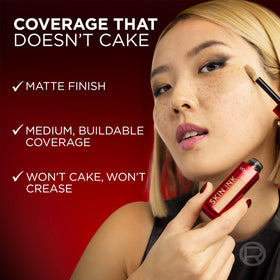 L'Oreal Paris bottle inside a travel bag highlighting convenience for on-the-go touch-ups