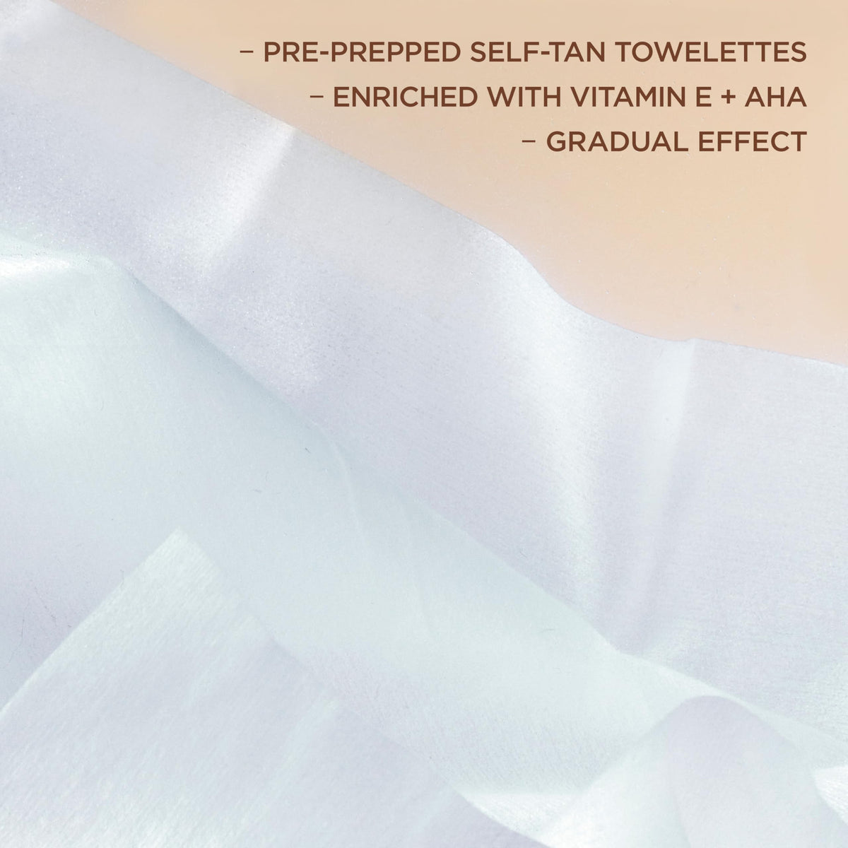 L'Oreal Paris applying towelette on arm for streak-free tan