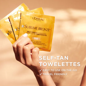 L'Oreal Paris opened packet with single self-tanning towelette visible