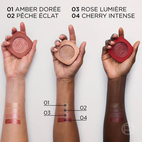 L'Oreal Paris model applying balm to cheeks for a natural radiant boost
