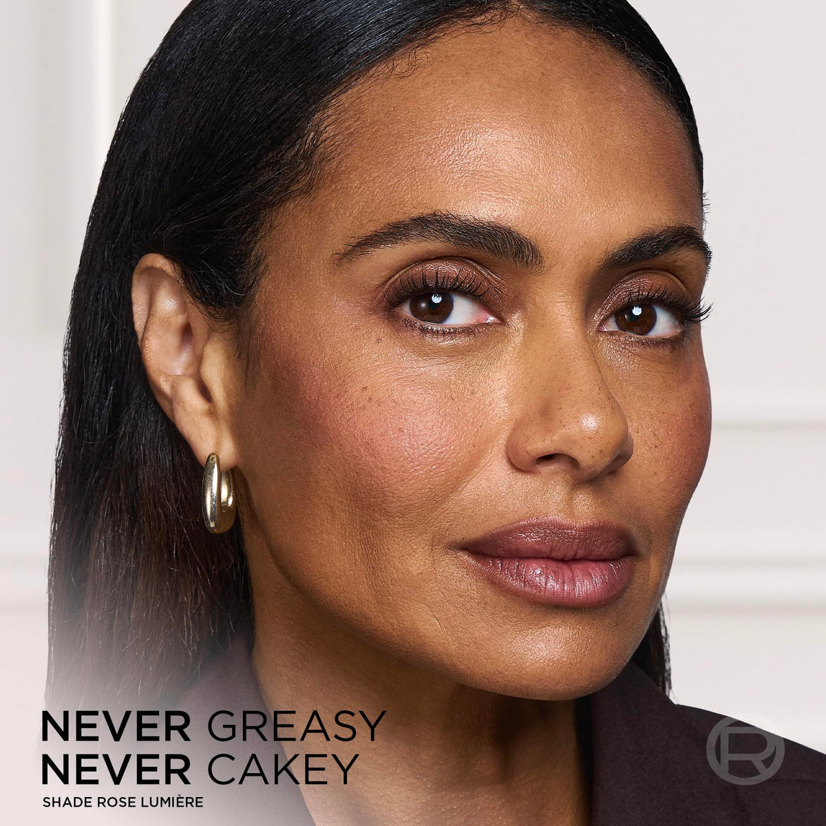 L'Oreal Paris balm applied on cheeks demonstrating natural radiant finish