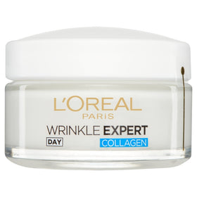 L'Oreal Paris cream held in hand to show 50ml scale and travel-friendly benefit
