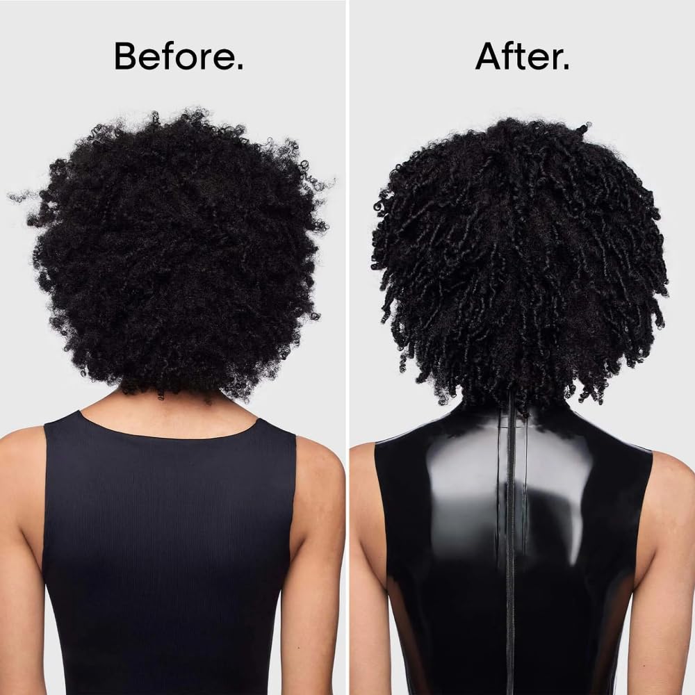 L'Oréal Professionnel bottle held in hand showing size and portability
