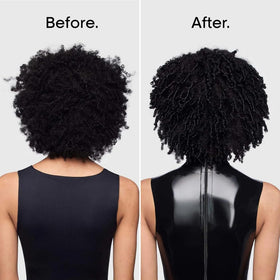 L'Oréal Professionnel bottle held in hand showing size and portability
