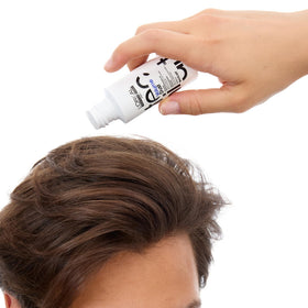 L'Oréal Professionnel Paris styled updo in lifestyle setting showing long-lasting hold benefit