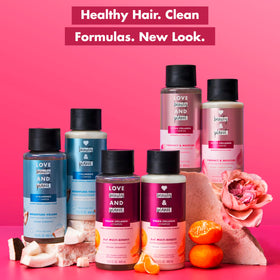 Love Beauty And Planet conditioner staged with roses for fresh floral fragrance appeal