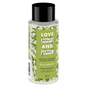 Love Beauty And Planet back label close-up listing ingredients and eco-friendly details