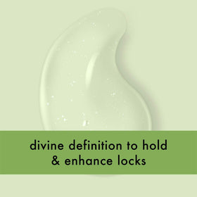 Love Beauty And Planet bottle staged with coconut and jasmine indicating scent profile