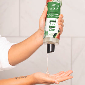 Love Beauty And Planet back label and recycling symbol emphasizing recyclability