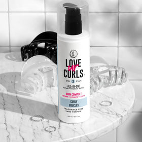 Love Ur Curls before and after curls showing defined, frizz-reduced results
