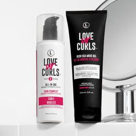 Love Ur Curls cream styler texture on fingers showing creamy slip benefit