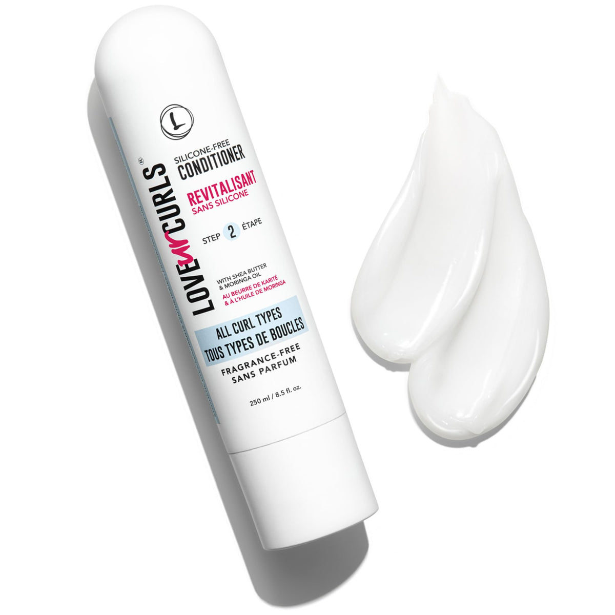 Love Ur Curls creamy conditioner texture close-up demonstrating slip and moisture