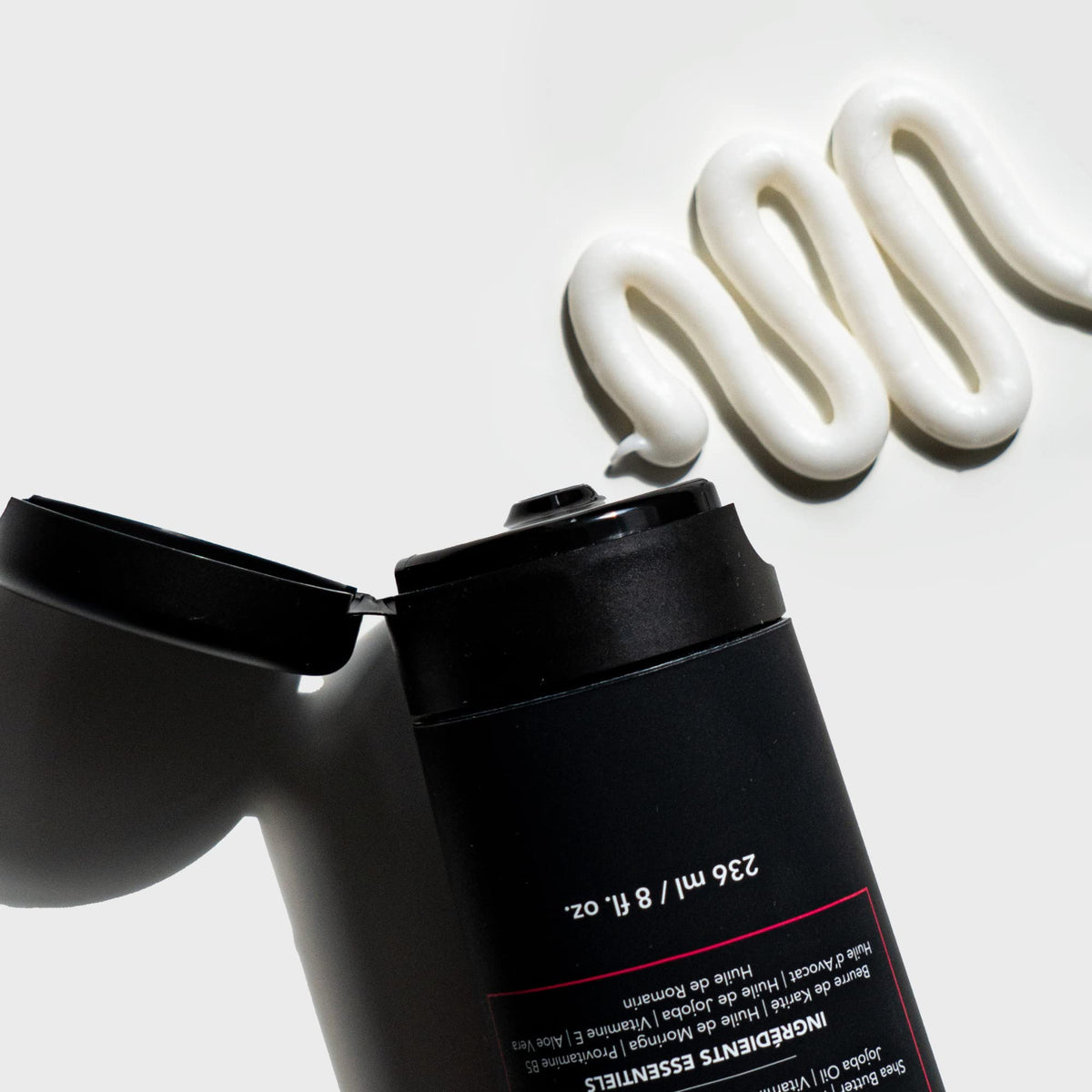 Love Ur Curls ingredients display with oils and shea butter highlighting natural nourishment