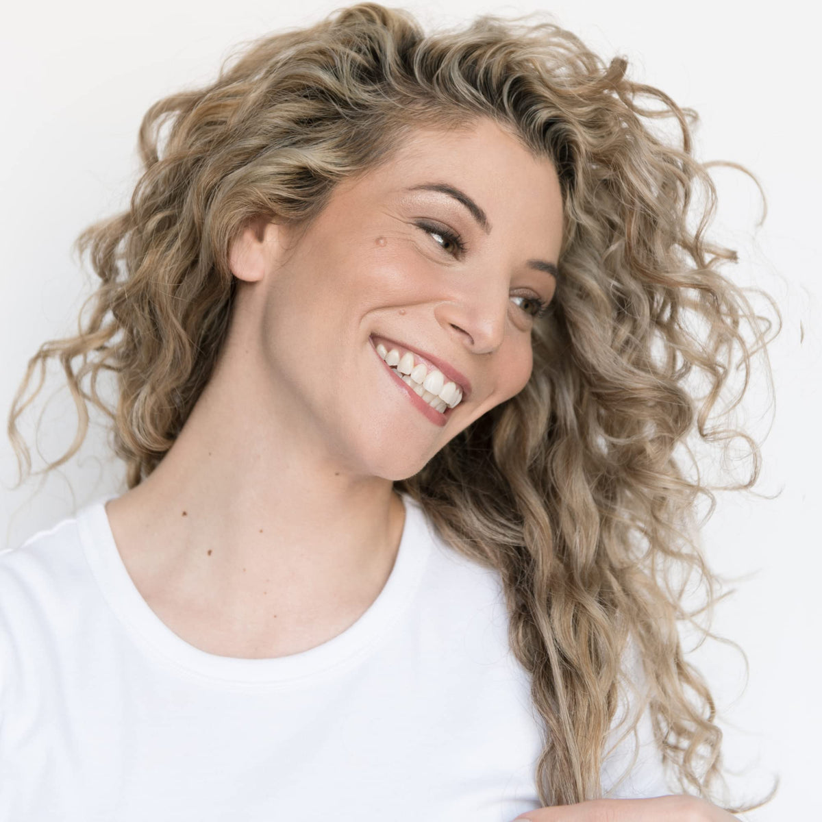 Love Ur Curls shea butter and moringa oil ingredients displayed to show nourishing benefits
