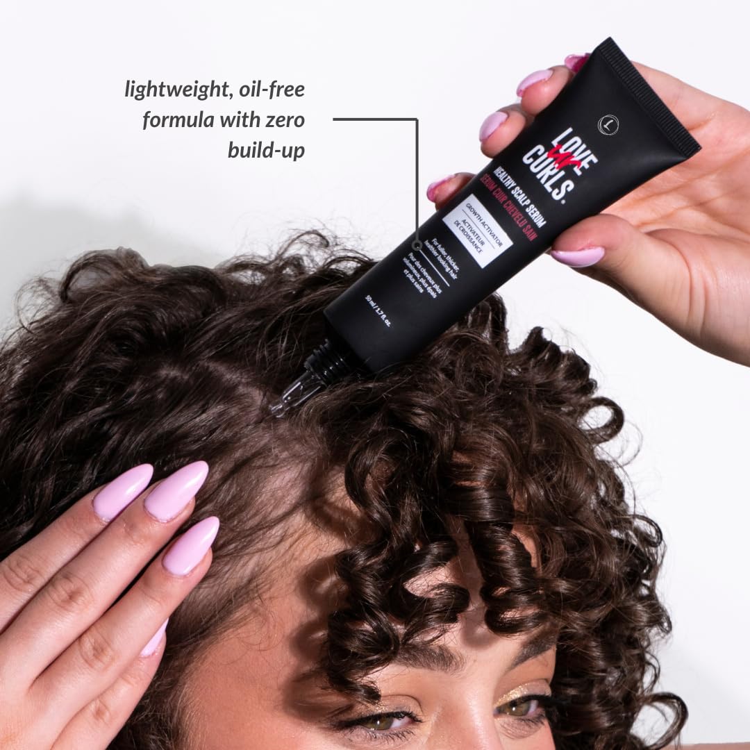 Love Ur Curls bottle beside ruler showing 50mL scale for reference