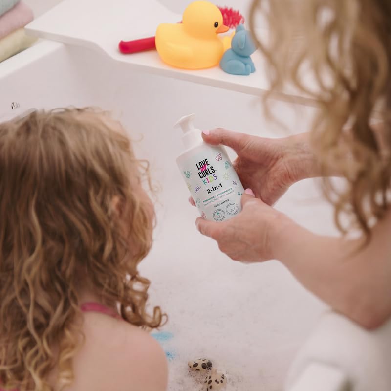 Love Ur Curls bottle beside ruler showing 300 mL size for travel-friendly benefit
