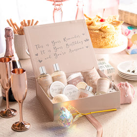 LOVERY 24k rose with surrounding items displayed as a decorative keepsake
