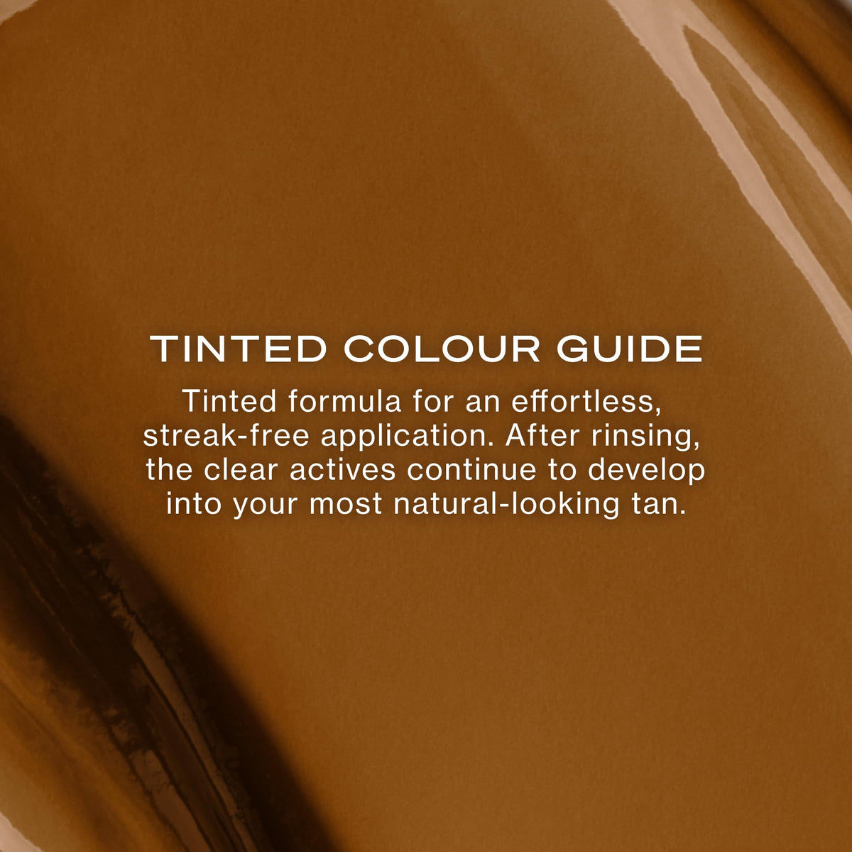 Loving Tan application on arm demonstrating tinted guide for streak-free, accurate tanning