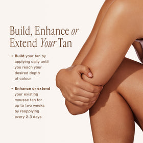 Loving Tan on model at beach showing natural bronze glow and confident appearance