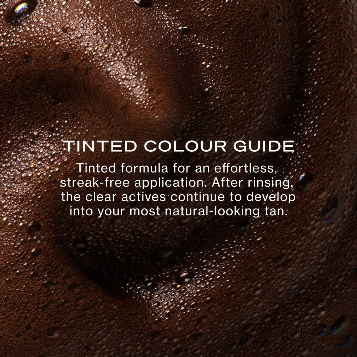Loving Tan visible guide tint on arm helping precise tanning application