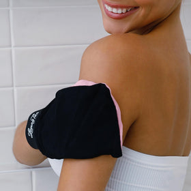 Loving Tan glove on hand showing size and ergonomic fit benefit