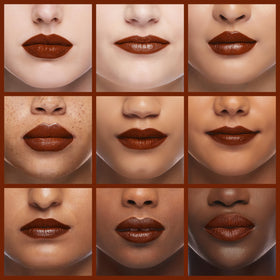 L'Paige model applying lipstick to lips demonstrating true color payoff