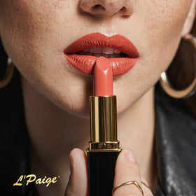 L'Paige lifestyle summer look with model wearing peach coral for warm glow