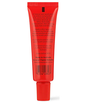 Lucas Papaw ointment texture on fingertip highlighting smooth, protective barrier benefit