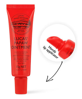 Lucas Papaw 15g tube held in hand showing compact size and easy carry benefit