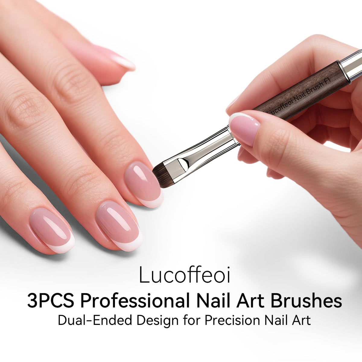 Lucoffeoi brush held next to fingers to show size and ergonomic wooden handle