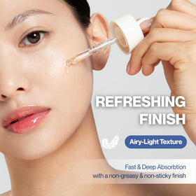 ludient ampoule beside a one-ounce marker showing compact travel-friendly benefit