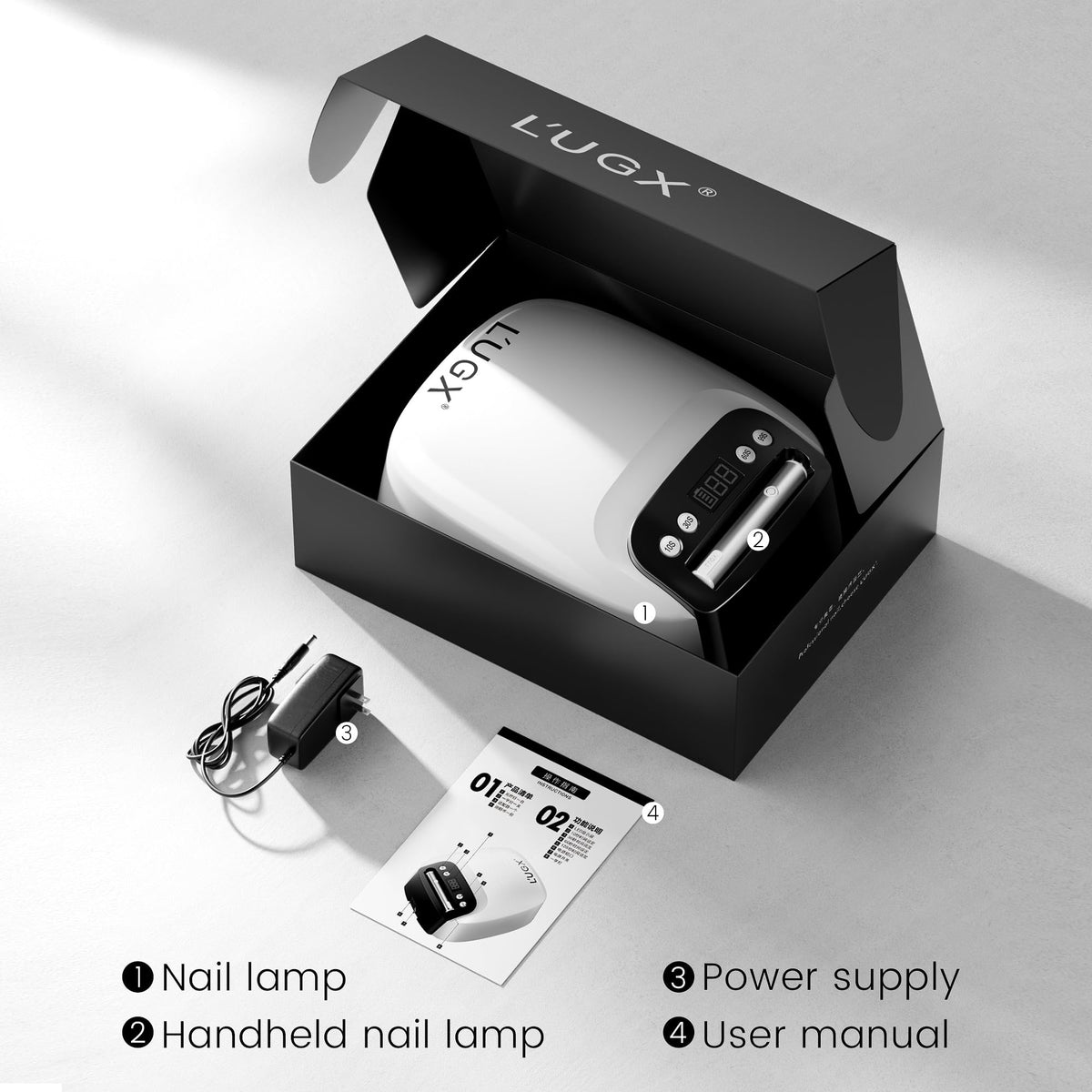 L'UGX handheld lamp beside a credit card for portable size comparison
