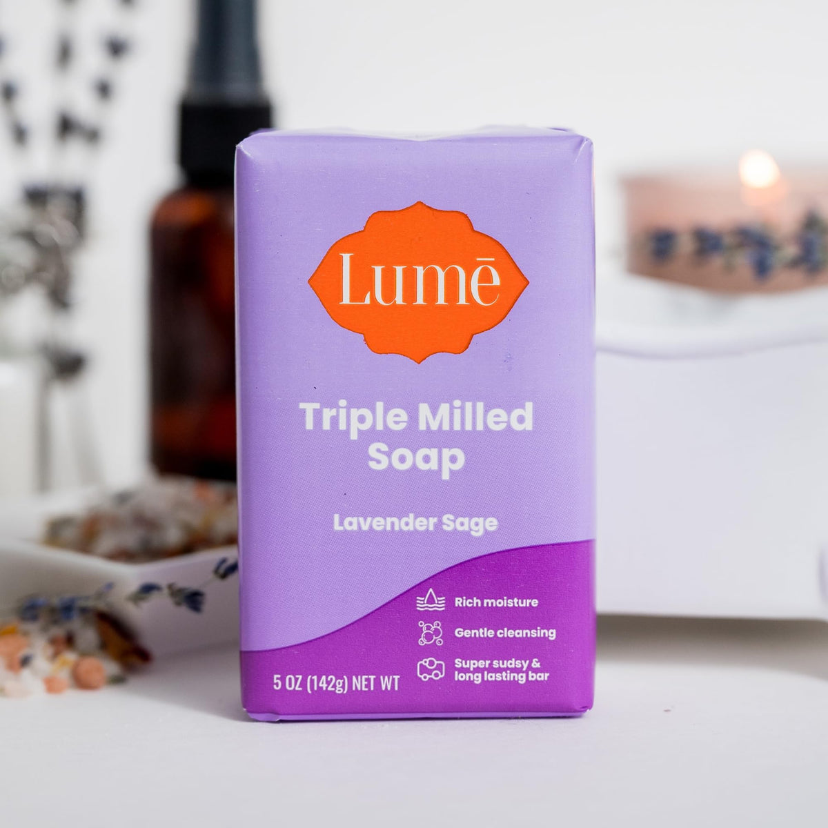 Lume bar on bathroom sink in a lifestyle scene implying calm scent and everyday comfort benefit