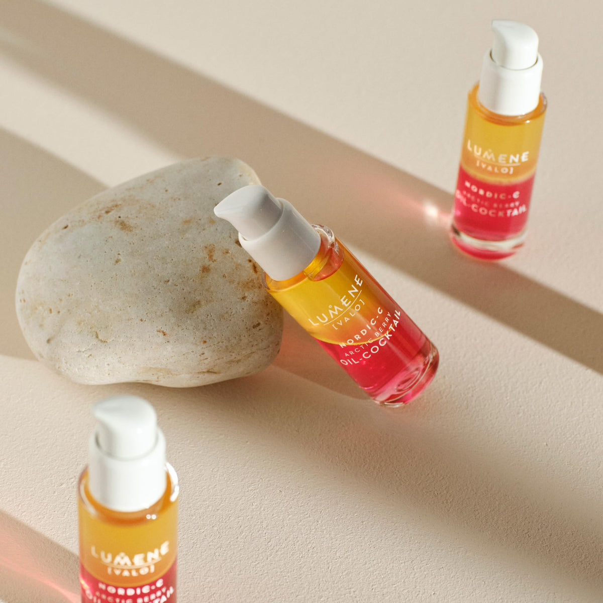 Lumene 30 ml bottle in hand demonstrating travel-friendly size and convenience