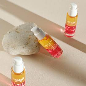 Lumene 30 ml bottle in hand demonstrating travel-friendly size and convenience