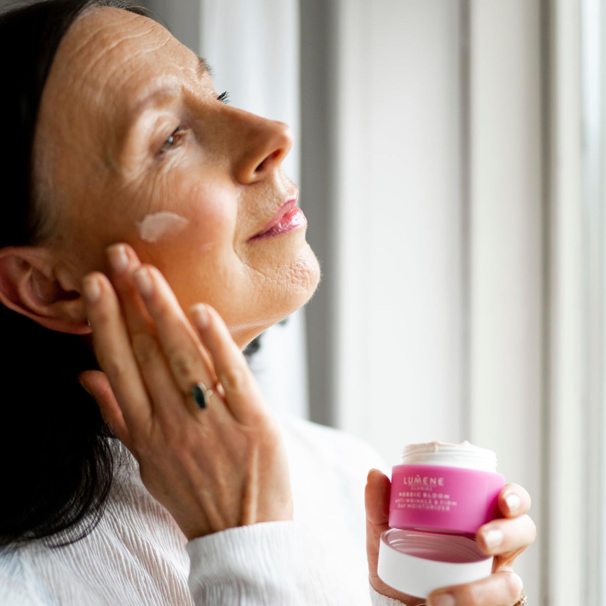 Lumene lingonberry extract close-up highlighting antioxidant-rich botanical benefits