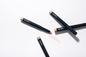 Lune+Aster model applying crayon to inner eye corner for instant brightening