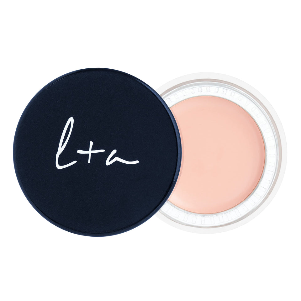 Lune+Aster front packaging showing compact corrective balm and label benefit