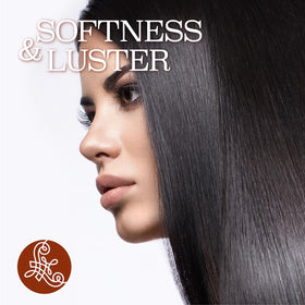 Hands detangling hair after Luseta treatment for reduced breakage