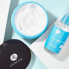 Applying Luseta mask to wet hair to demonstrate deep moisturizing effect