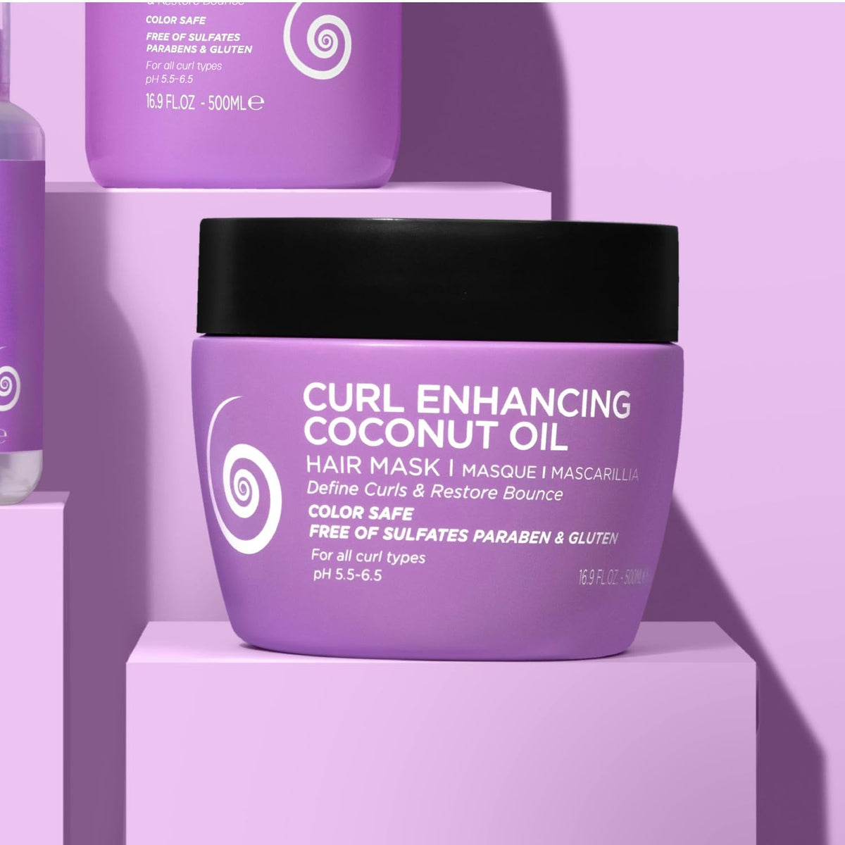 Luseta applied to curly hair demonstrating smoother, defined curls