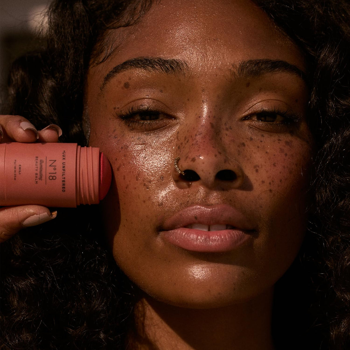 Lux Unfiltered blended finish on skin, seamless dewy sun-kissed sheen