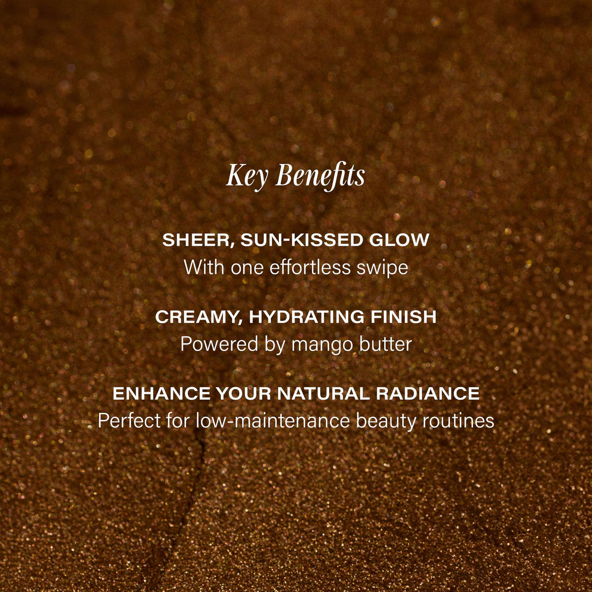 Lux Unfiltered N°18 swatch on arm showing buildable sheer bronze warmth