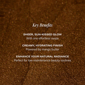 Lux Unfiltered N°18 swatch on arm showing buildable sheer bronze warmth