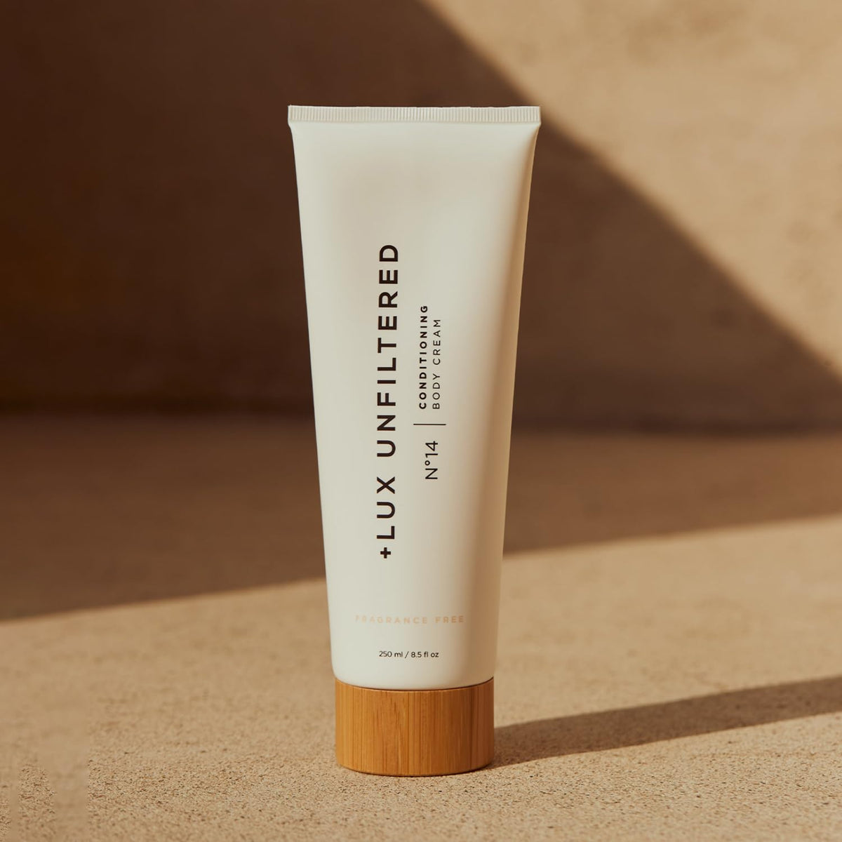 Lux Unfiltered bottle on bathroom shelf in routine setting suggesting daily moisturizing use