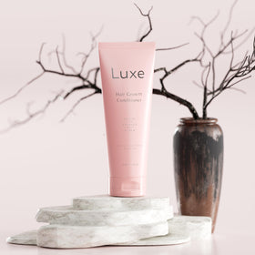 LUXÉ cream texture close-up demonstrating smooth plant-based formula for nourishment