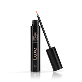 LUXE applicator brush close-up for precise nightly application benefit