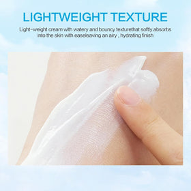 LYROYREG applying sunscreen on hand showing non-greasy finish